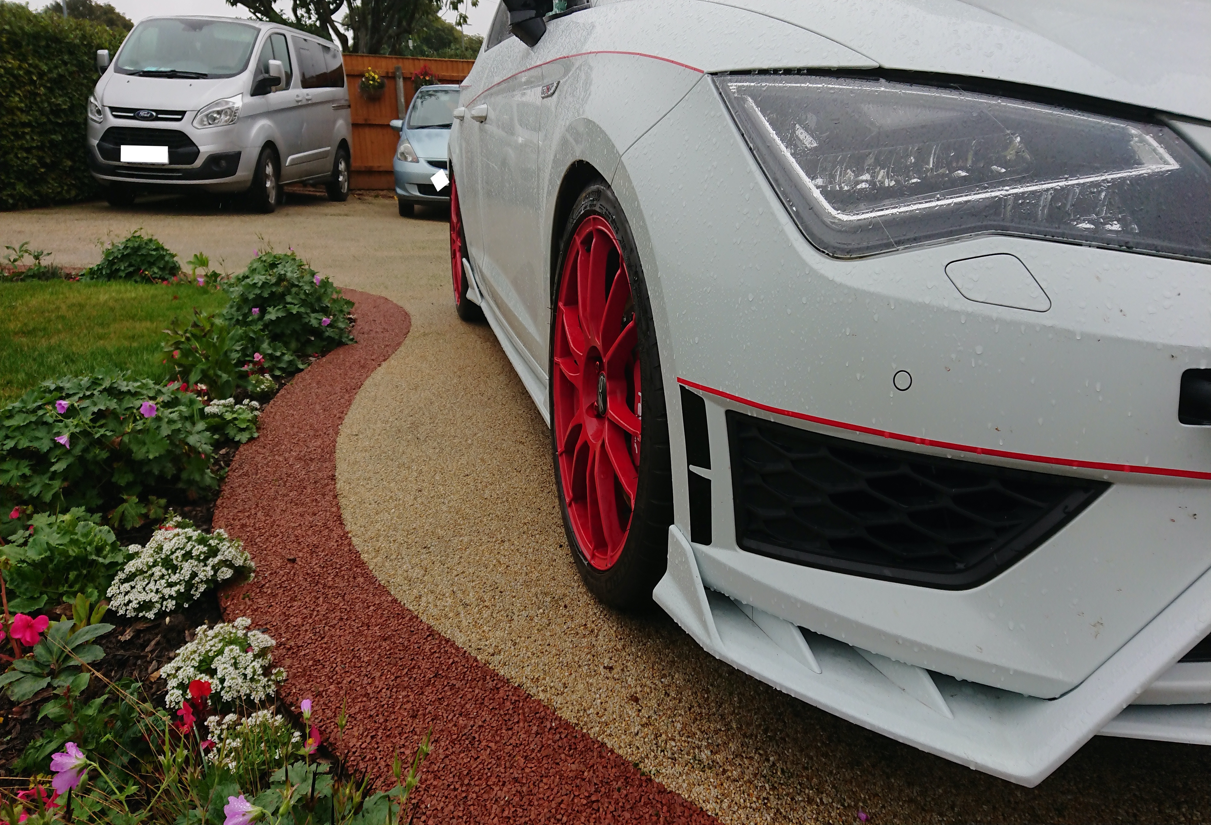 A car parked on the side of a road
Description automatically generated